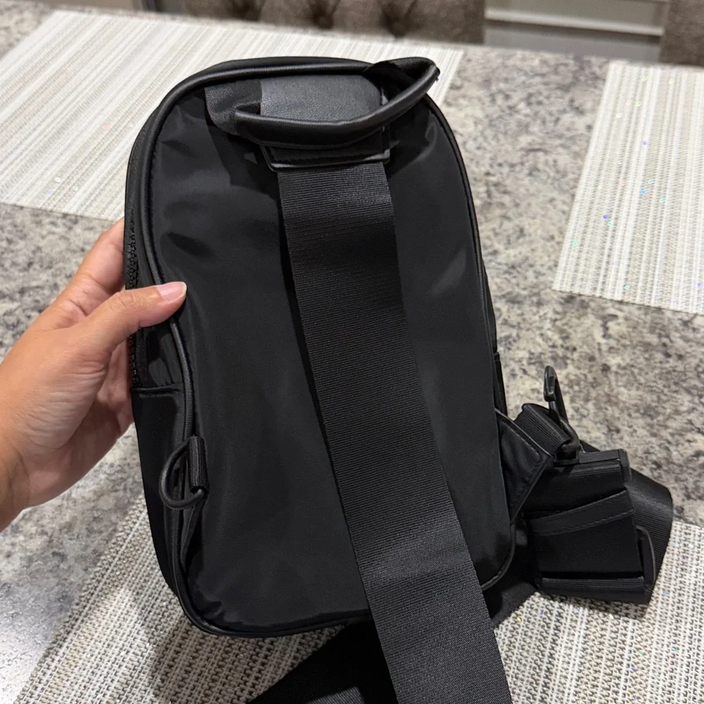 No Boundaries Women’s Black Hands Free Sling Bag Backpack NWOT